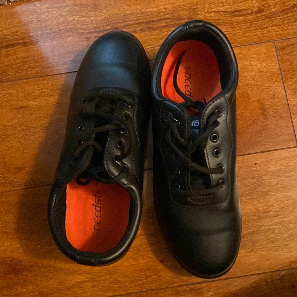 Speedsters black shoes. Woman’s size 11 mens size 9